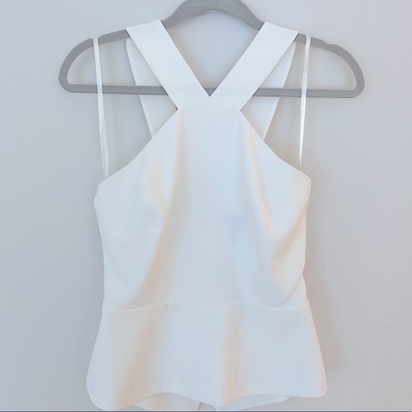 BCBGMaxAzria Tops - BCBG High Neck, Open Back Peplum Top